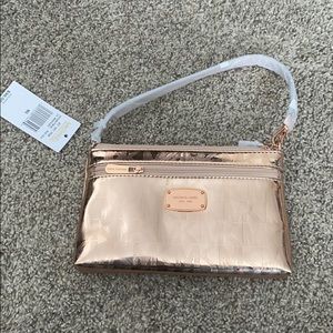 MICHAEL KORS rose gold mini bag/wristlet